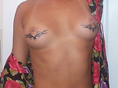 Breasts-With-Tattoos-and-Nipple-Piercings.jpg